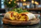 Brokastu burrito pildīts ar olām, bekonu un sieru
